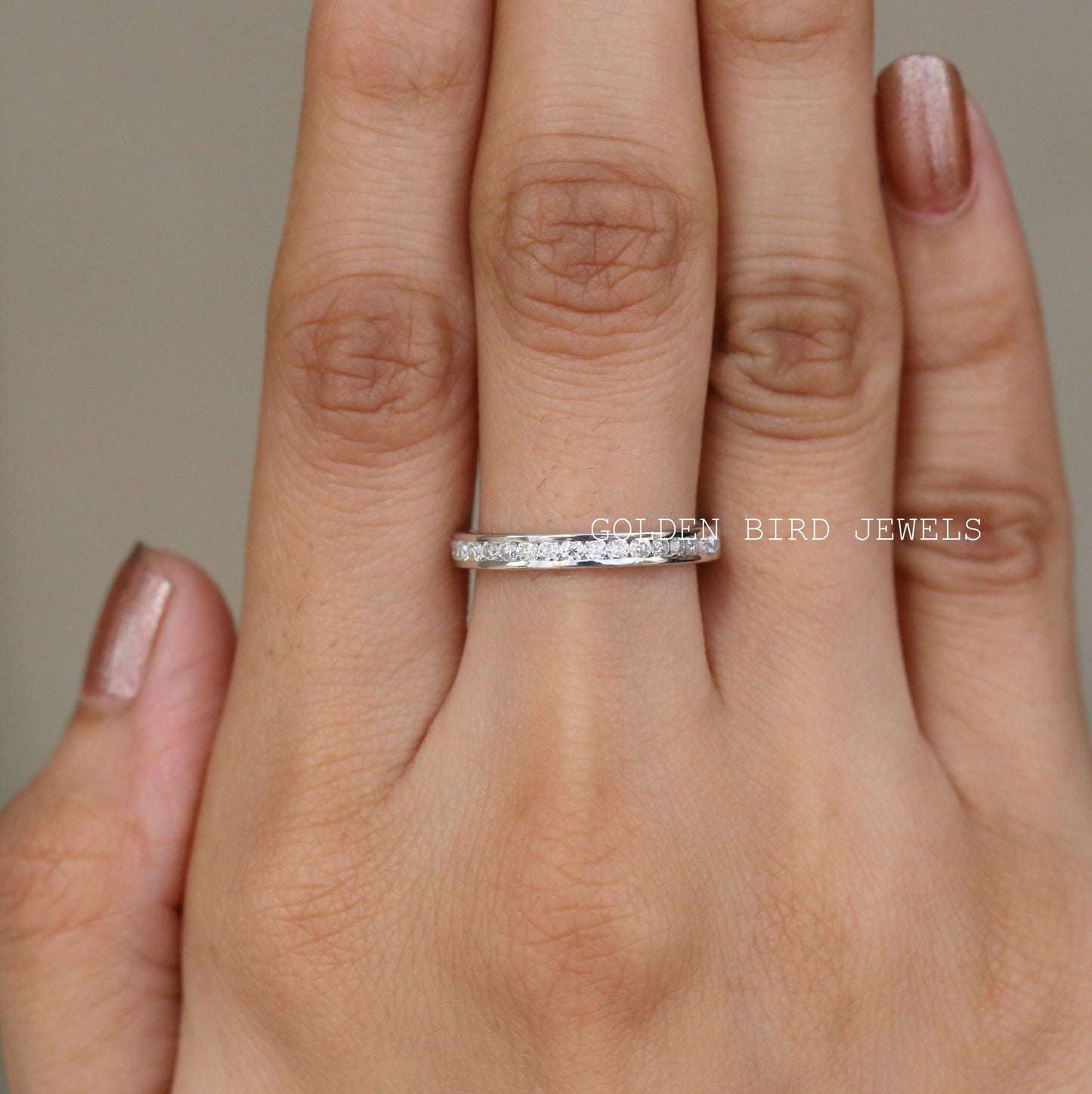 Channel Set Round Moissanite Wedding Band in 10K