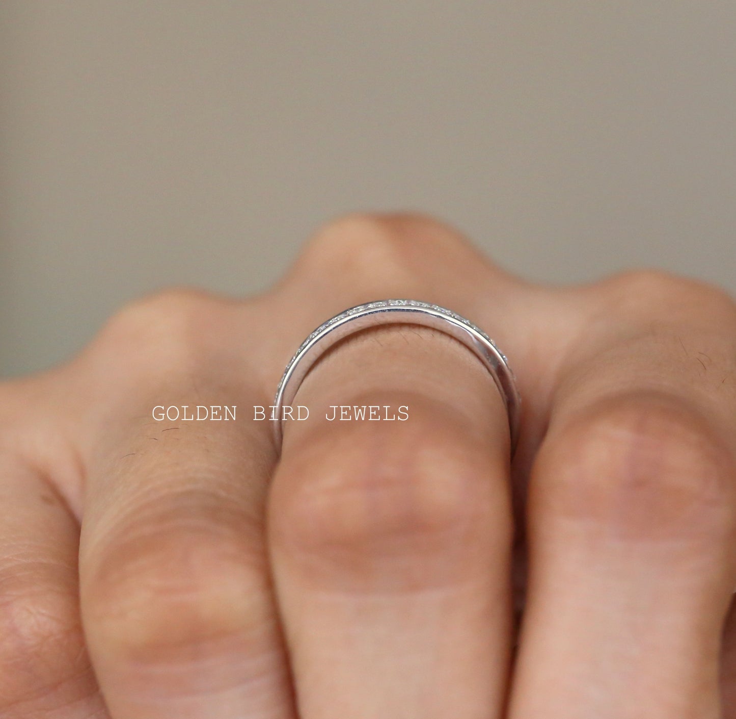 Channel Set Round Moissanite Wedding Band in 10K