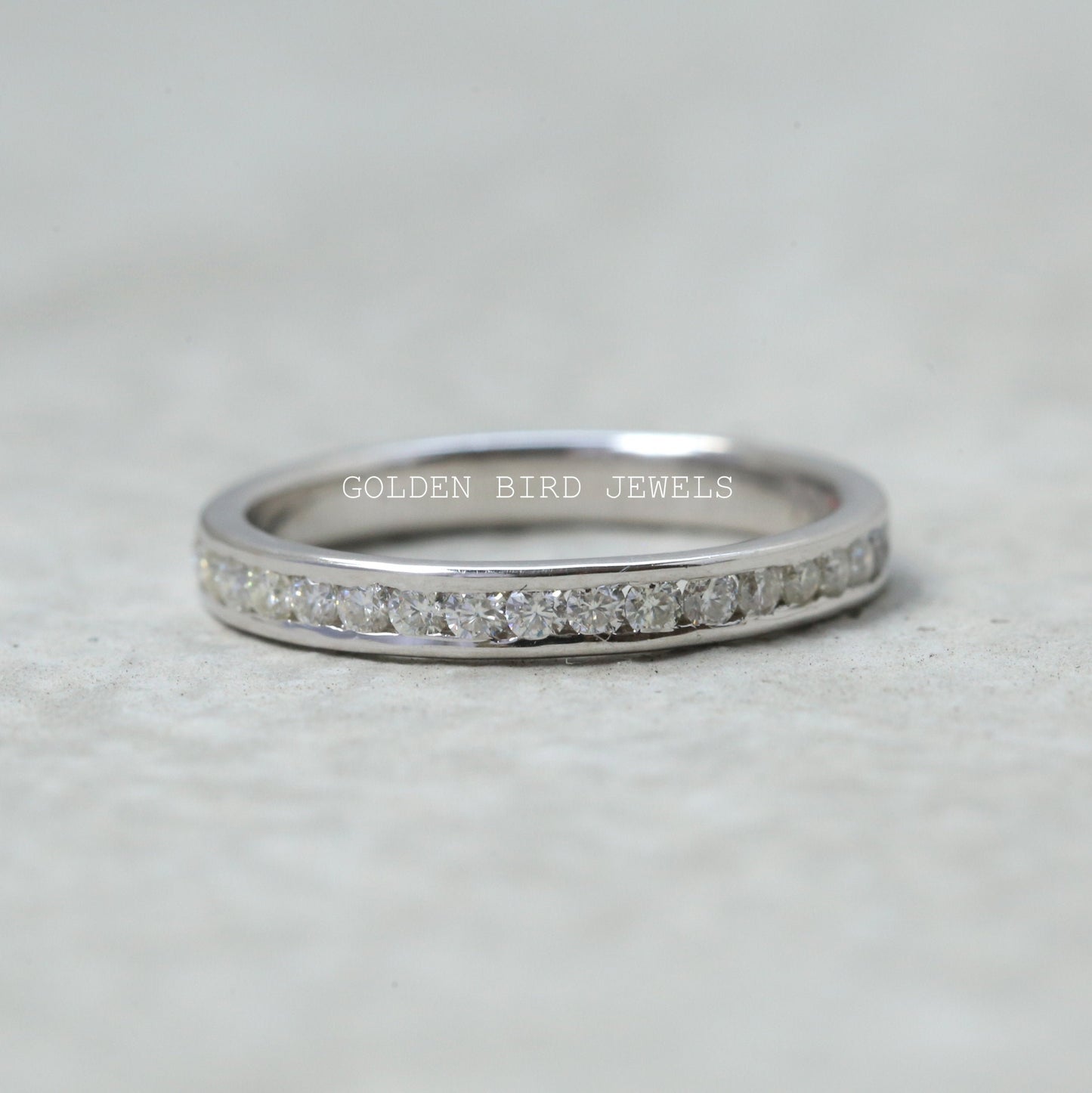 Channel Set Round Moissanite Wedding Band in 10K