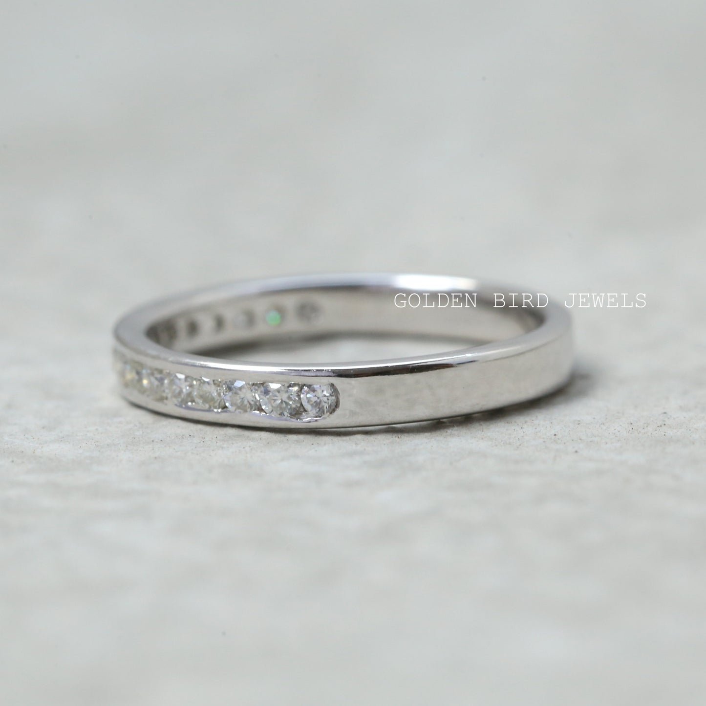Channel Set Round Moissanite Wedding Band in 10K
