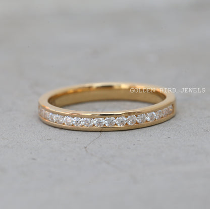 Channel Set Round Moissanite Wedding Band in 10K